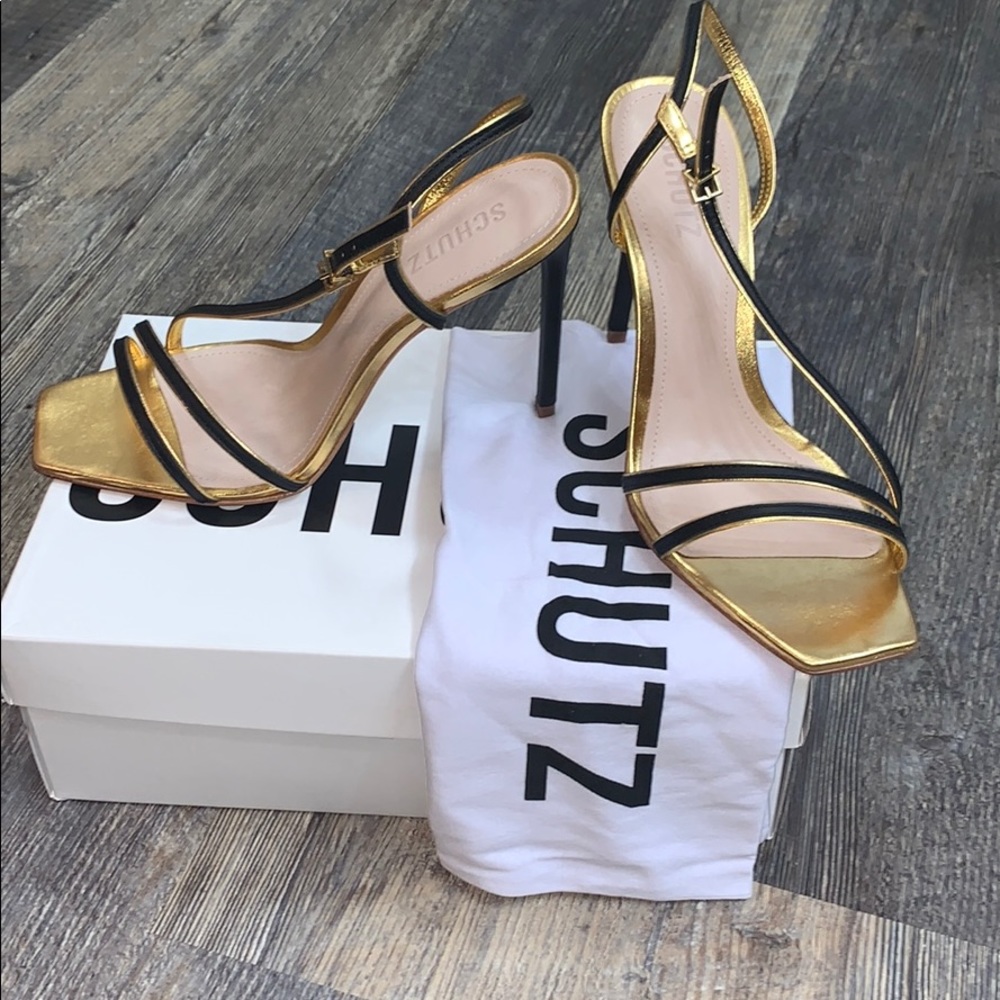 Metallic gold and black Luna Sandal by Schutz